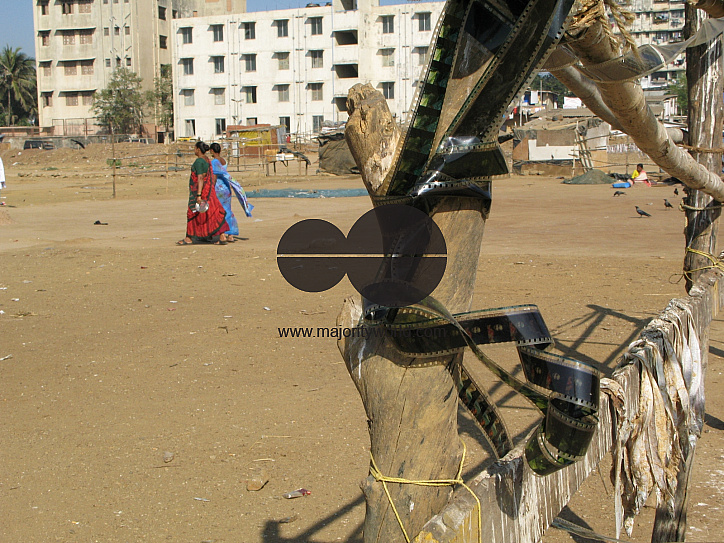 INDIA.Film rushes used to hang clothes to dry in the slums of Mumbai.