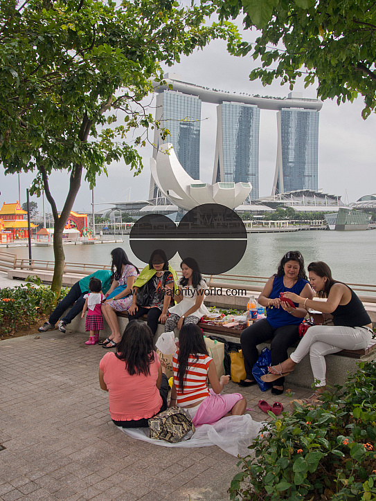 Migrant domestic workers enjoy a day off by the Bay side in Singapore