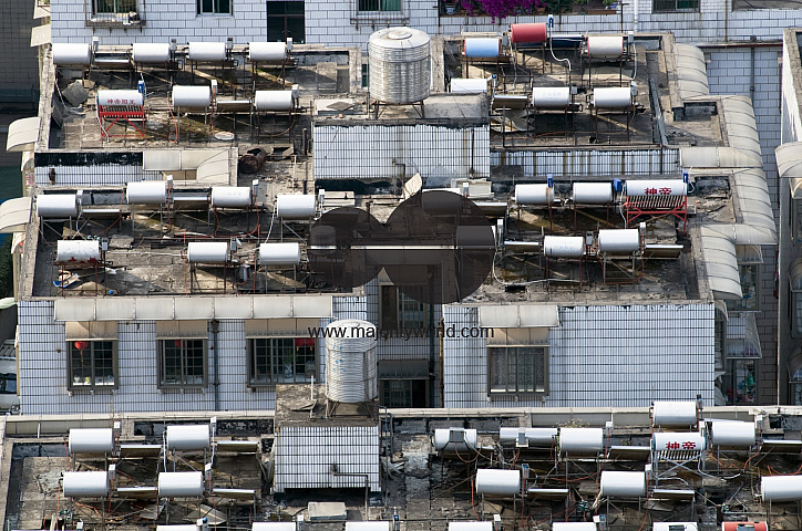 CHINA Solar panels installed on roofs of apartment buildings and offices in Kunming, Yunnan province.