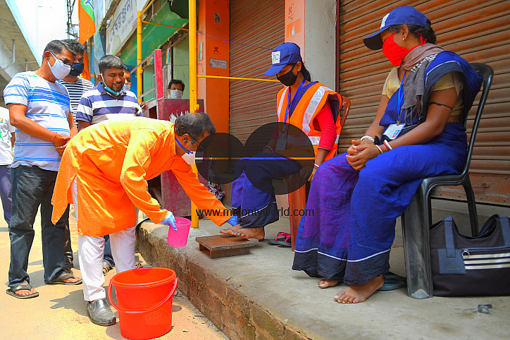 Cleaning the feet of safari workers (Cleaning Staff)