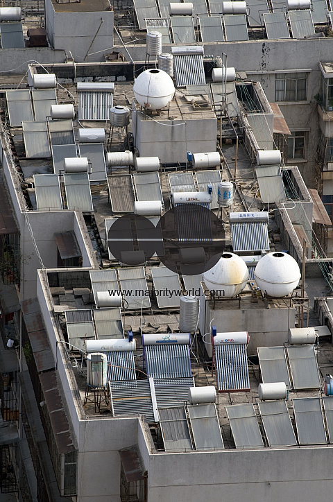 CHINA Solar panels installed on roofs of apartment buildings and offices in Kunming, Yunnan province.