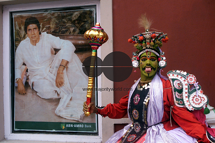 A South Indian dancer acts during a stage show at a dance festival in Kolkata