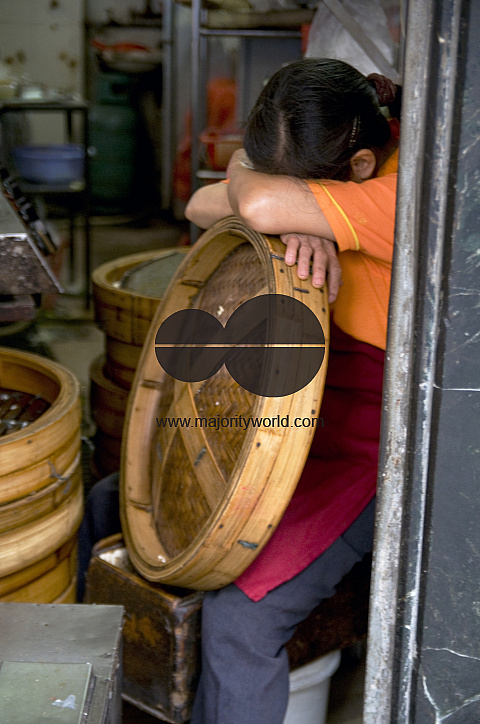 CHINA Migrant workers from the countryside working in shops and restaurants in Guangzhou, Guangdong province.
