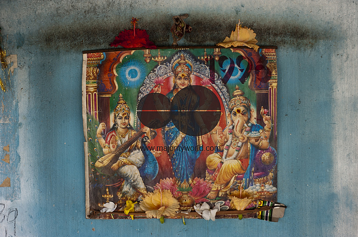 Sri Lanka. Wall shrine in small Hindu kovil (temple) in the village of Tirukovil.