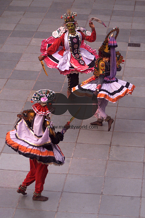 South Indian dancers perform dance during a stage show at a dance festival in Kolkata, India