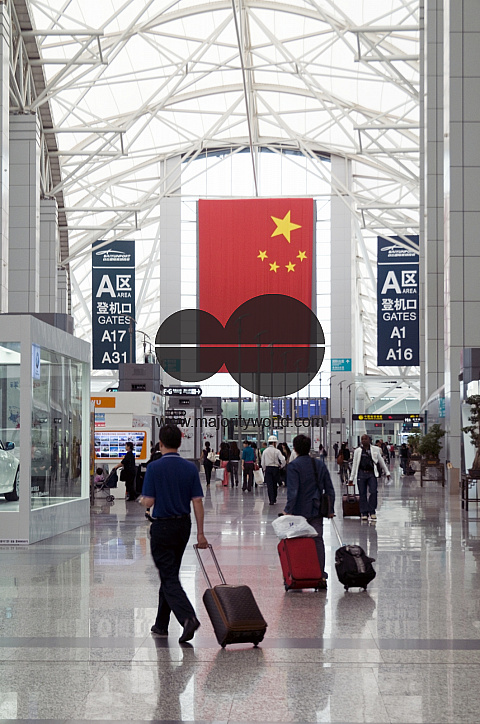 CHINA Passengers at the new terminal of the international airport of Guangzhou, Guangdong province.