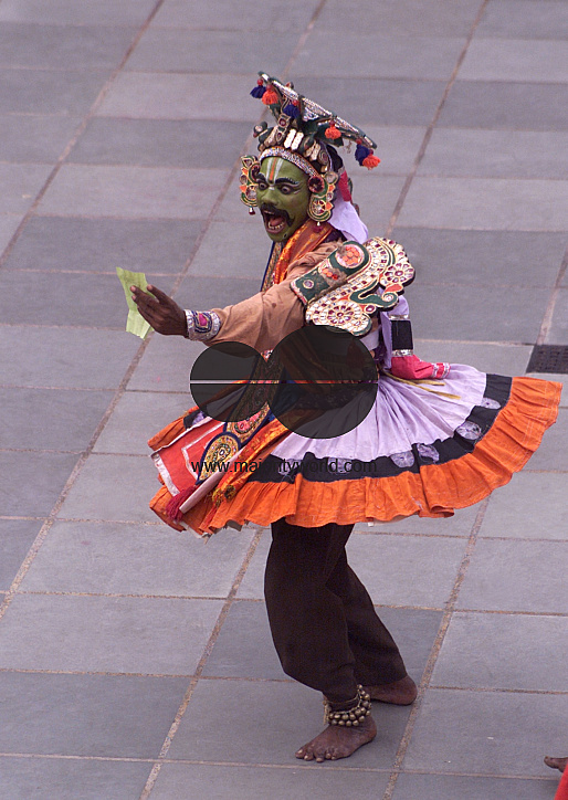 A South Indian dancer performs during a stage show at a dance festival in Kolkata, India