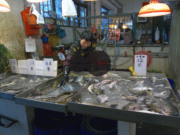 CHINA Fishmonger in the market in Macau.
