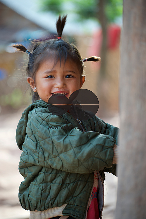  A young girl child smiles