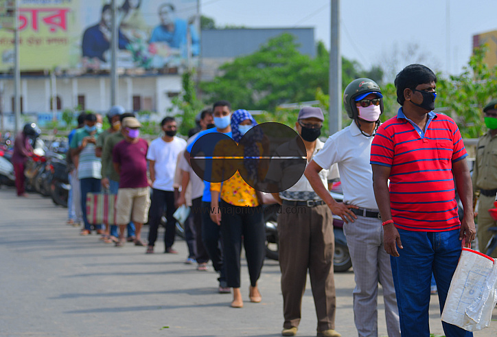 People are standing in a line, to check their temperatures