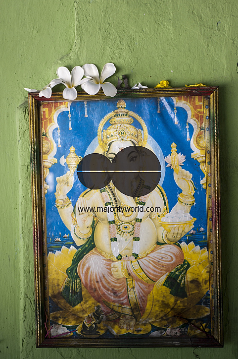 Sri Lanka. Lord Ganesh framed. Wall of  small Hindu Kovil in the village of Tirukovil. East Coast.