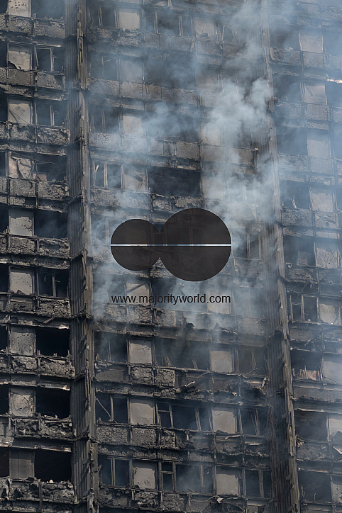 Fire brigade and community groups helping with fire disaster at  of Grenfell Tower in West London,UK