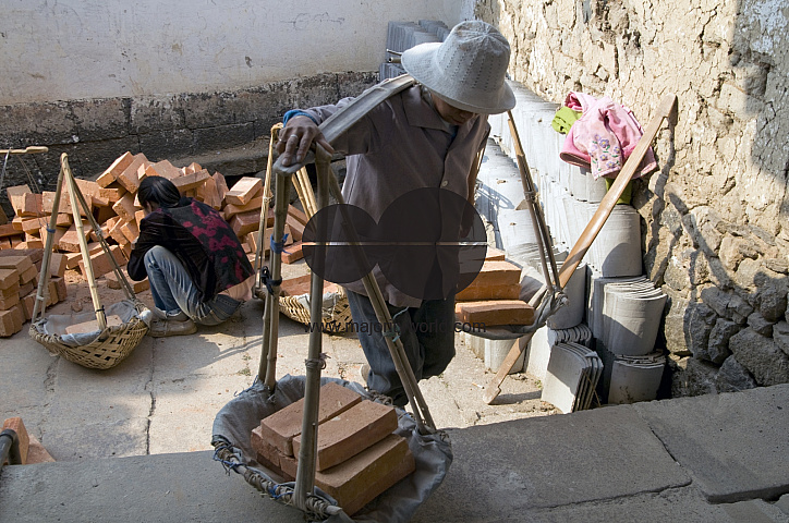 CHINA Migrant workers from the countryside working in construction in Kunming, Yunnan province.