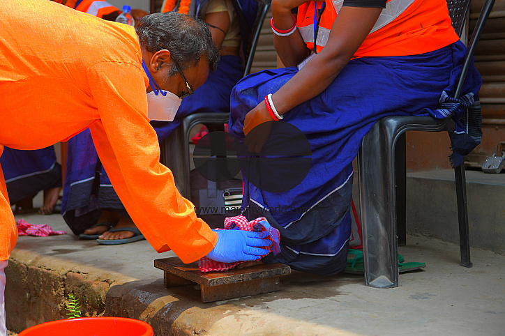 Cleaning the feet of safari workers (Cleaning Staff)