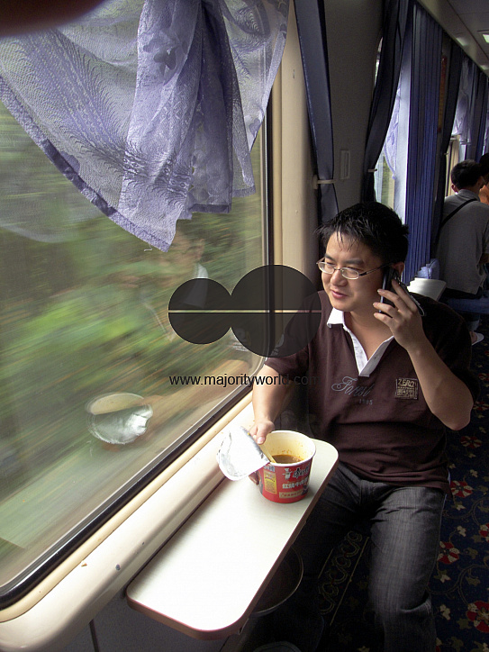 CHINA Travellers on a long distance train from Kunming to Xiamen.