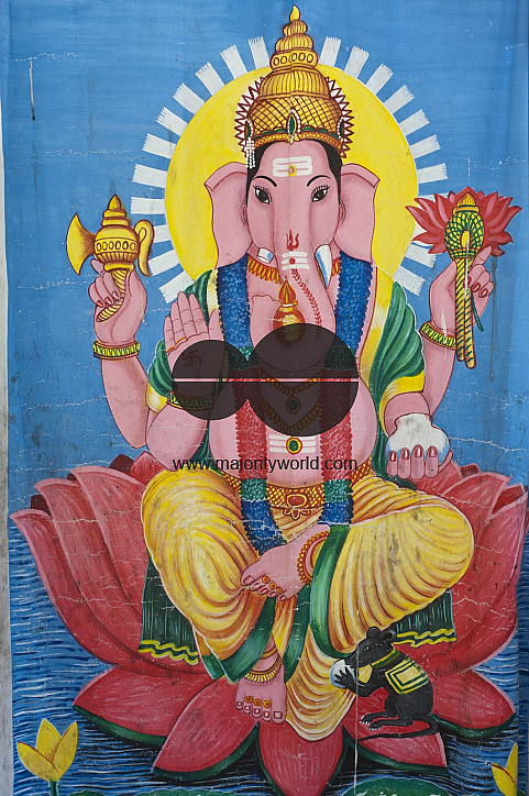 Sri Lanka. Lord Ganesh painted on cloth screen.  Small Hindu Kovil in the village of Tirukovil. East Coast.
