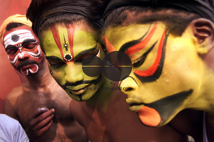 South Indian dancer prepare themselves before a stage show at a dance festival in Kolkata