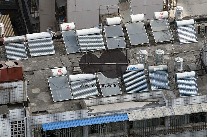 CHINA Solar panels installed on roofs of apartment buildings and offices in Kunming, Yunnan province.