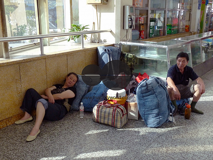 CHINA Migrant workers waiting for train to return to their provinces during Spring holidays. Xiamen, Fujian..