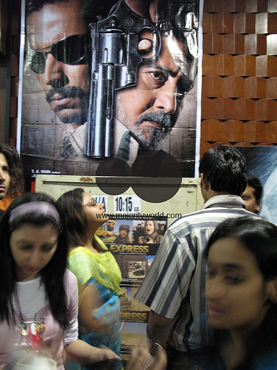 INDIA.People during an interval at the Regal Cinema in Mumbai.