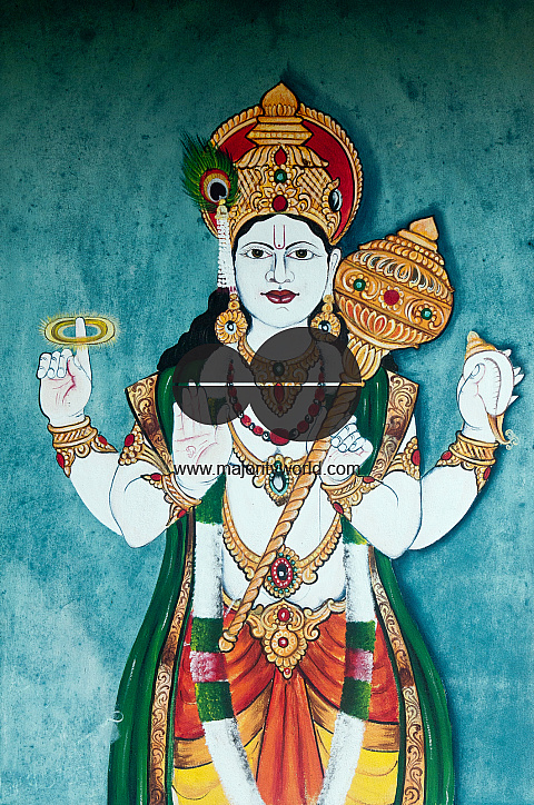 Mauritius. Painting of a Hindu deity at one of the many Hindu temples on the island.