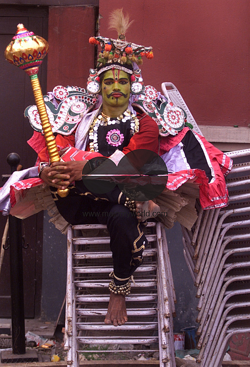 A South Indian dancer waits for his turn during a stage show at a dance festival in Kolkata, India