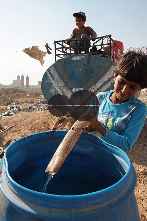 Photo story - Abu Mohammad and His family - the relationships between a poor family how they live.