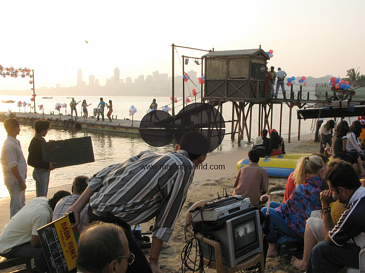 INDIA.Filming a music and dance routine in a set at Chowpatty beach in Mumbai.