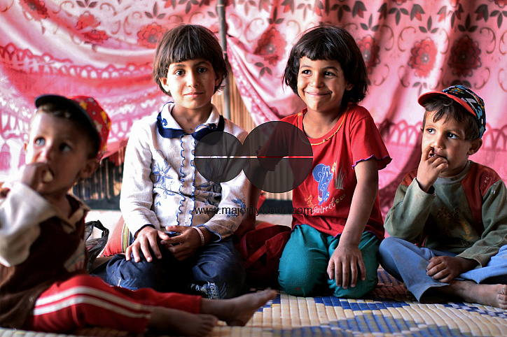 Photo story - Abu Mohammad and His family - the relationships between a poor family how they live.