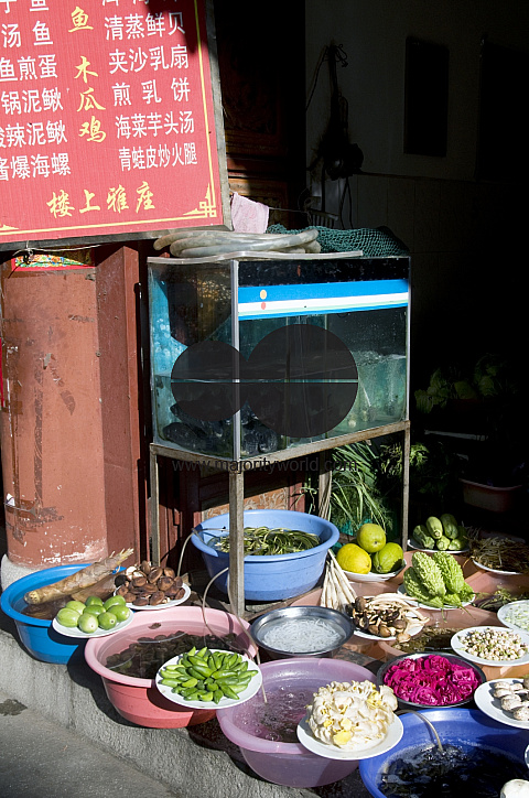 CHINA Restaurant displaying food to choose from in Dali, Yunnan province..