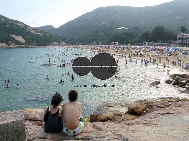 CHINA Couple during weekend at Shek o beach in Hong Kong.