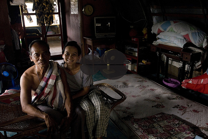 Thailand. Poonsuk Raman on his house boat in Ayuthaya.