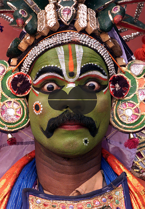 A South Indian dancer performs during a stage show at a dance festival in Kolkata, India