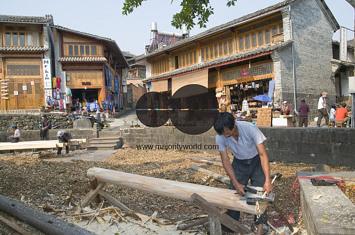 CHINA Migrant workers from the countryside working in construction and restoration at a village in Yunnan province.