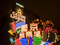 CHINA Neon lights of the old Lisboa casino in Macau.