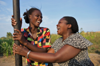  Two adolescent girls laugh
