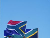 Waving the South African flag at a sports event
