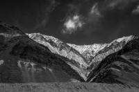 The Ladakh Range, southeastern extension of the Karakoram Range, is made of granite rocks of the Ladakh Batholith.