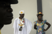 Traditional healer Gbeko Agnhenuh Ajeoda and his wife outside the Accra football stadium.