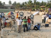 INDIA.Lighting technicians in a set at Chowpatty beach in Mumbai.