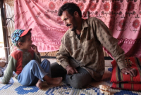 Photo story - Abu Mohammad and His family - the relationships between a poor family how they live.