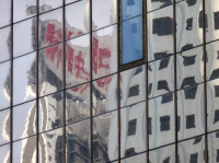CHINA Reflections on the windows of the Bank of China in Hong Kong.