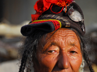 A Ladakhi woman sitting near the temple square in Leh, Ladakh.