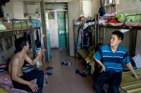 CHINA Migrant workers from the countryside in their cramped dormitories in Shenzhen, Guangdong province.