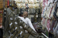 Yemen. Shopkeeper in Old City of San'a'.