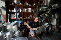 Mauritius. Alain, panel beater. In his workshop on Rue Pasteur in China Town.