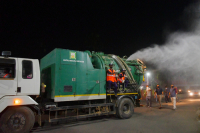 Workers Spray Disinfectant to Contain Coronavirus