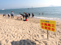 CHINA Chinese tourists on a beach in Gulangyu island near Xiamen in Fujian province.
