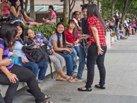 Migrant domestic workers enjoy a day off by the Bay side in Singapore